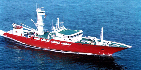 Large Red Boat moving in the ocean